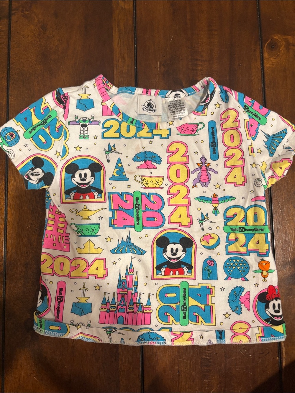 Disney Kids White Tee with Pink, Yellow, Blue & Green 2024 Print